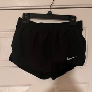 Nike running shorts with built in briefs. EUC.